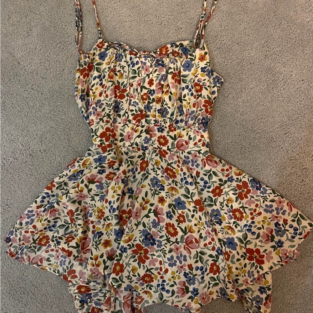 Floral open back romper size small